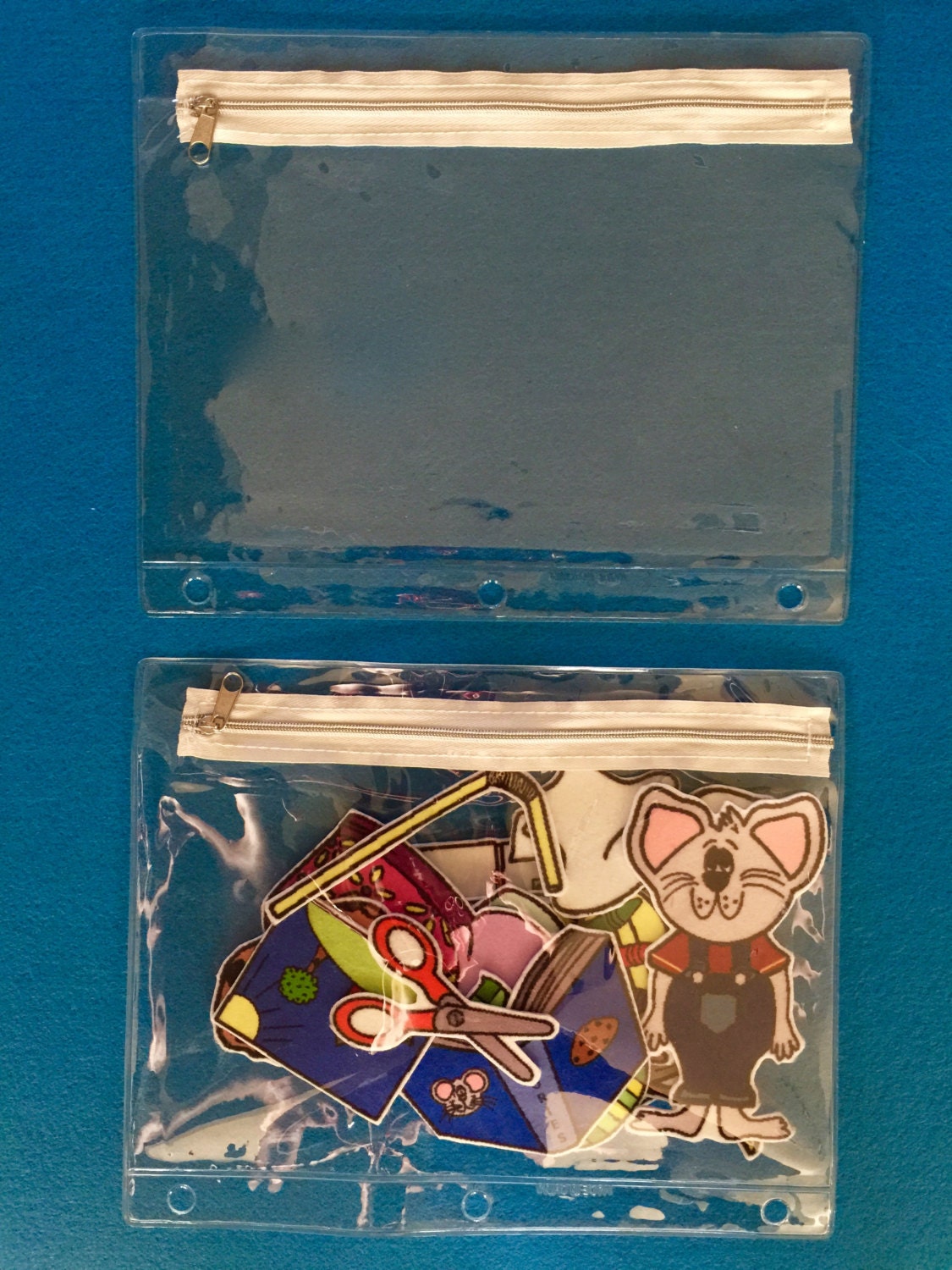 10 Clear Vinyl Zippered Pouches. Fit in a Standard 3-Ring Binder.Organize your felt board sets